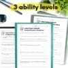 Example comprehension worksheets for Lady Evelyn Cobbold showing different ability levels. Pencils and folders included in the flat lay.